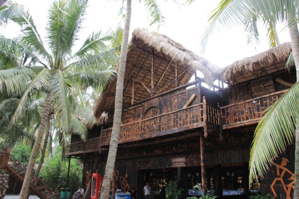 安徽人造仿真茅草度假休闲茅草屋价格农家乐塑料屋面茅草