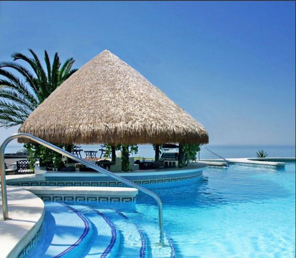 海边游泳池茅草小屋案例